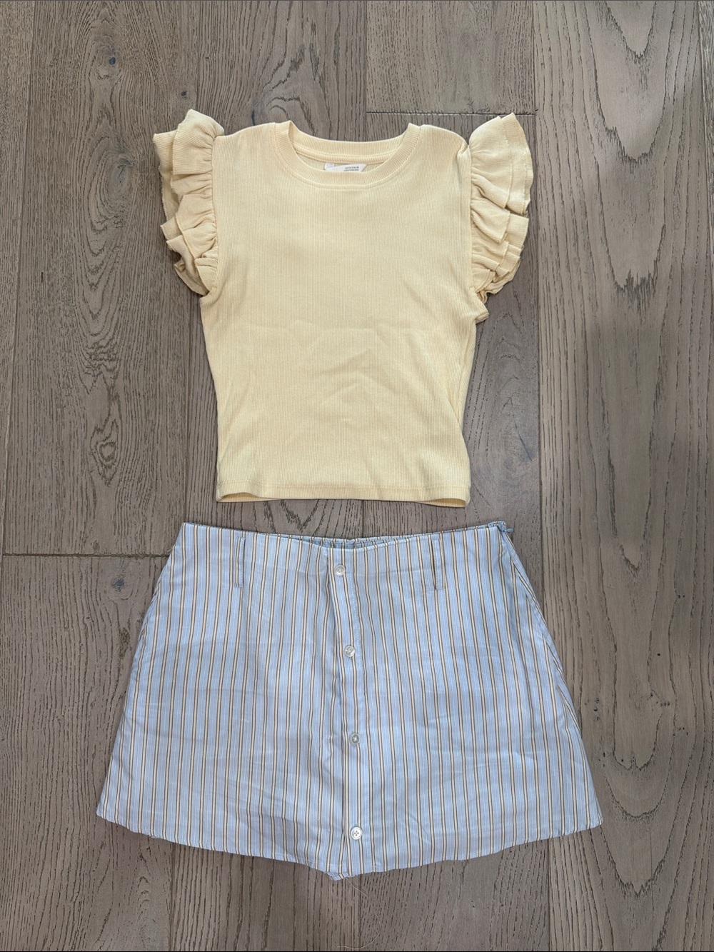 Zara Pale Yellow Ruffle Sleeve Top with Blue & White Striped Button Shorts